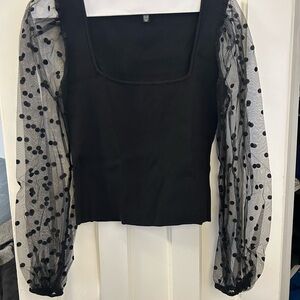 Lucy Paris Black Top with Sheer Polka Dot Sleeves